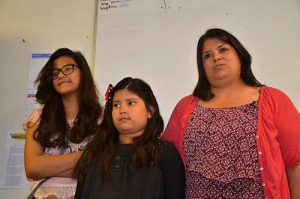 Brenda Villa, with her two daughters are fighting to stop the deportation of their husband and father, Erik Canton. Photo by Gabriela Flora, AFSC.